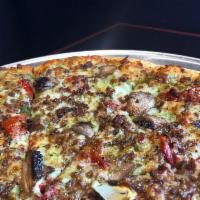 Large B-Ripp Pizza · Sun-dried tomatoes, mushrooms, sausage, artichoke, and pesto sauce.