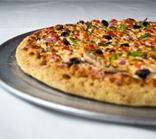 Large Heavy Veggie Pizza · Mushroom, green pepper, black olive, Roma tomatoes, red onions, extra cheese, and red sauce.