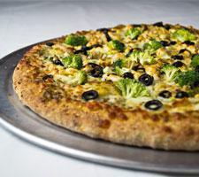 Large Pesto Mambo Pizza · Artichoke hearts, feta, broccoli, black olives, and pesto sauce.