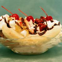 Shortbeach Split · 3 scoops ice cream- vanilla, chocolate, strawberry;  1 split banana; crushed pineapple; stra...