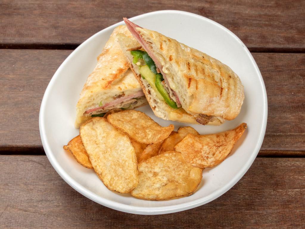 Cuban Sandwich Lunch · Roasted pork, ham, jalapenos, pickles, mojo, mustard and baguette.
