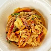 Chicken Louisiana · Chicken Breast with smoked sausage and shrimp (shrimp is extra if chosen) drizzled with Caju...
