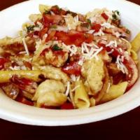 L.A Pasta · Chicken, chorizo, and shrimp ( shrimp extra) with onion and peppers and Cajun cream sauce to...