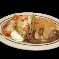 1. Cheese Enchilada Combo · Cheese enchilada and beef taco or beef tamale served with rice and beans. Your choice of pro...