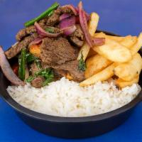 Lomo Saltado Plate · Beef stir fry, french fries and jasmine rice.