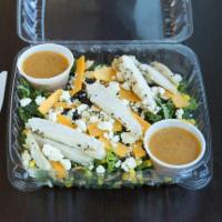 New Mexico Baby Kale Salad · Baby kale, blackened chicken breast, red onion, almonds, feta and cheddar cheese, black bean...