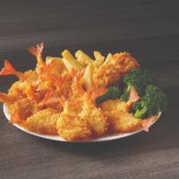 15 Piece Butterfly Shrimp Meal · A plentiful portion of our butterfly shrimp served with your choice of 2 sides and hush pupp...