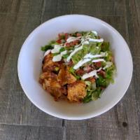 Grilled Chicken Burrito Bowl · Grilled marinated chicken breast, rice, Jack cheese, salsa, and, lettuce choice of pinto or ...