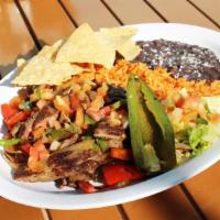Steak Fajitas · Half pound of angus steak grilled with fresh bell peppers, onion and pico de gallo, served w...