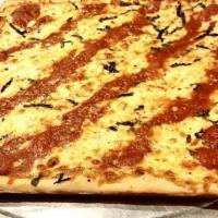 Grandma · Tomato sauce, mozzarella, Parmesan, garlic and basil on a house made, hand stretch crust, st...