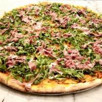 Prosciutto Arugula · Tomato sauce, mozzarella, prosciutto, arugula, garlic and basil drizzled with balsamic on a ...