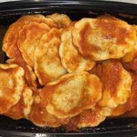 16 oz. Meat Ravioli · Handcrafted ravioli filled with beef and Parmigiana Reggiano in a fresh Pomodoro (tomato) sa...