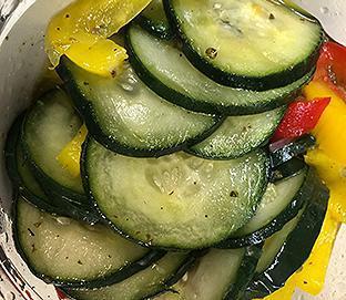 14 oz. Cucumber Salad · Sliced cucumber tossed with chopped bell peppers and onion, dressed in a simple blend of extra virgin olive oil and vinegar, salt, sugar and spices.