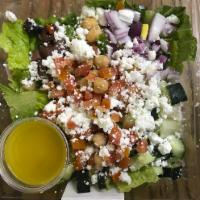 14 oz. Mediterranean Chopped · Chopped romaine lettuce topped with crumbled feta cheese, red onion, chick peas, tomato, cuc...