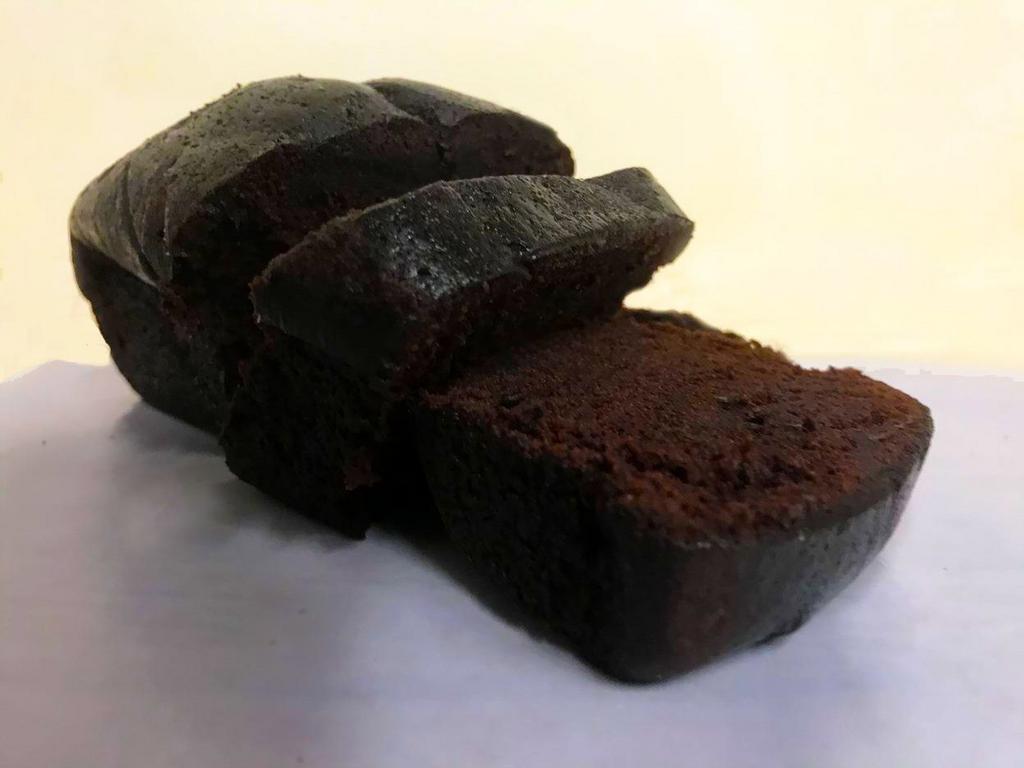 Chocolate Tea Cake · Moist, fluffy chocolate cake perfect for snacking or sharing with friends. [Allergens: Egg, Wheat]