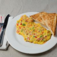 Western Omelette · Egg omelette with ham, onions, and peppers.