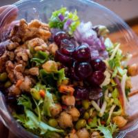 SUPER GREEN SALAD · Fresh Greens, Grapes, Cranberries, Edamame, Chickpeas, Red Onion, Walnuts, Shaved Veggies wi...