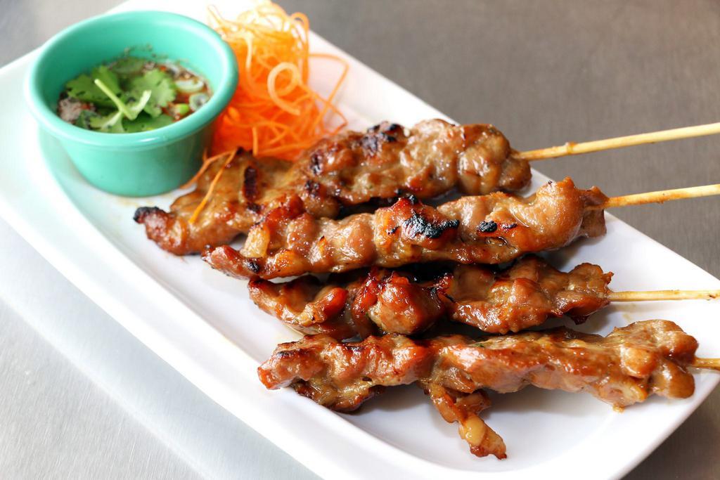 4 Pieces Moo Yang · Grilled marinated pork on skewers served with spicy sweet plum sauce. Mild.