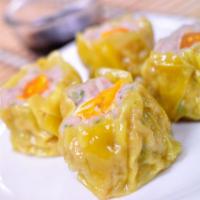 5 Pieces Thai Dumplings · Crab meat, shrimp, minced pork and water chestnuts wrapped in wonton skins and served with T...