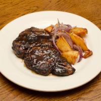 Steak · herbed grilled Angus rib-eye, rosemary potatoes confit and Chef's bourbon sauce. (GF)