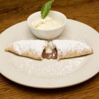 Calzone Di Nutella · pizza dough stuffed with chocolate hazelnut cream and baked to order