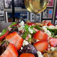 Strawberry Salad · Quarry's spectacular strawberry pecan made with crisp romaine lettuce, spinach, fresh strawb...