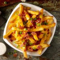 Cheese Fries · Crispy French Fries, Creamy Queso, Bacon and Scallions.