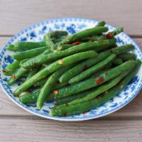 Garlicky Green Beans · Green beans with garlic and chili butter.