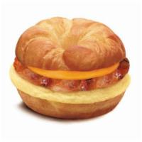 Crossaint with Bacon, Egg & Cheese Large · Buttery croissant with fluffy eggs, melted cheese and savory sausage