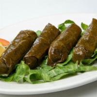 Grape Leaves · Tender grape leaves stuffed with rice and vegetables