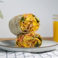 Classic Breakfast Burrito · A warm flour tortilla filled with scrambled eggs, jack cheese, cheddar cheese, avocado, pico...