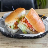 6. Buffalo Chicken Sandwich · Served with cheese, lettuce and tomato.