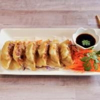 6 Piece Chicken Potstickers · Pan fried, stuffed with seasoned chicken and vegetable served with sweet soy sauce.