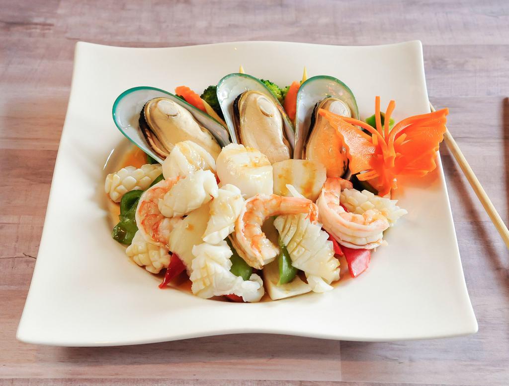 Ocean Seafood · A combination of shrimps, scallops, squid, mussels, onion, green beans and bell peppers sauteed in spicy basil sauce. Spicy. Gluten-free option available.