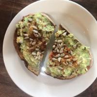 Avocado Toast · Toasted Italian bread with seasoned smashed avocado and toppings. Add egg for an additional ...