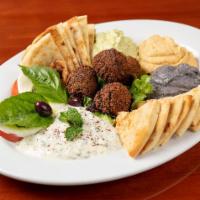 Combo Appetizer · Combination of our homemade Mediterranean appetizers: hummus trio, tzatziki and falafel combo.