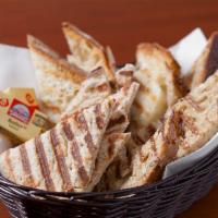 Bread Basket · Choice of grilled tuscan country or pita bread.