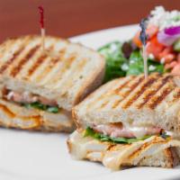 Chicken Brie Panini · Oven roasted chicken, tomatoes, fresh basil and Brie cheese.