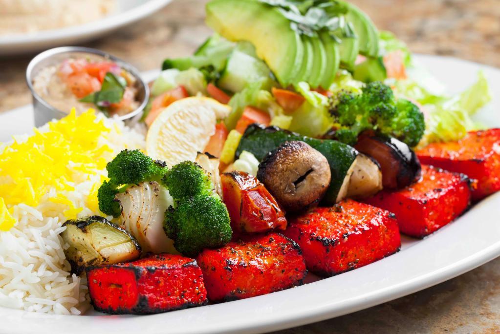 Organic Tofu Kabob · Served with a skewer of grilled vegetables and hummus and your choice of rice.