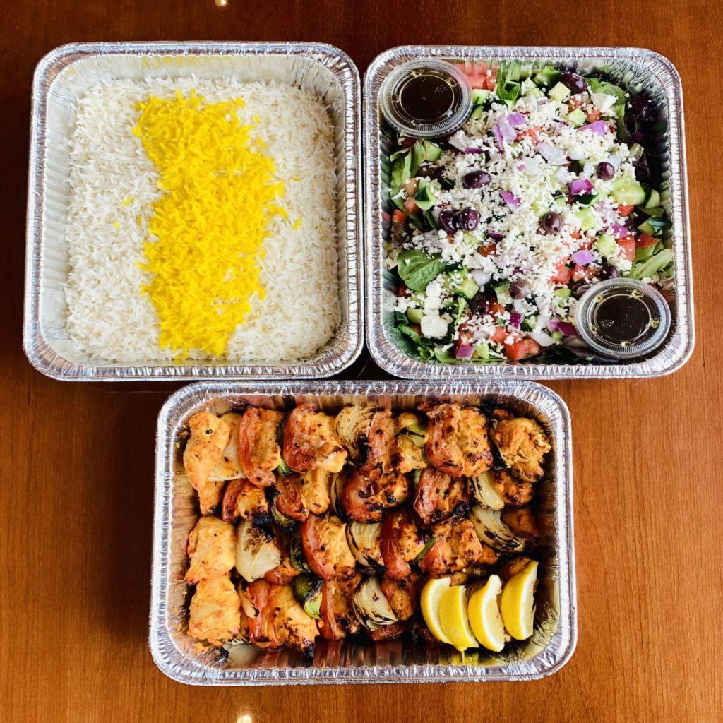 Family Combo (4) · 4 Charbroiled ABF Chicken Skewers Served with Choice of Rice and Choice of Salad. Feeds up to 6 people.