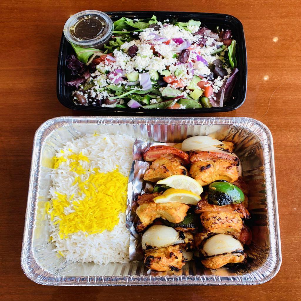 Family Combo (2) · 2 Charbroiled ABF Chicken Skewers Served with Choice of Rice and Choice of Salad. Feeds up to 3 people.