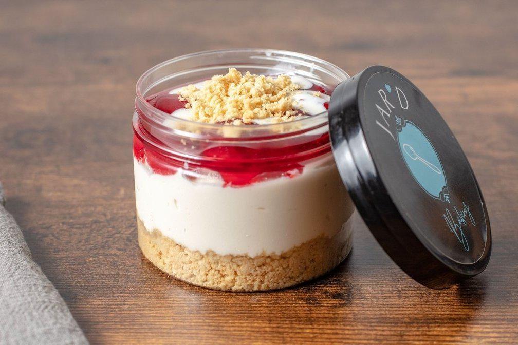 Strawberry Cheesecake Jar  · Our Original Cheesecake topped with glazed strawberries and vanilla crumble.

