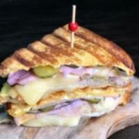 Cuban Sandwich · Ham, pork, pickles, Swiss cheese, mayonnaise and mustard with a side of Soda or Bottle of wa...