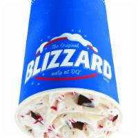 Candy Cane Chill Blizzard Treat · Peppermint candy cane pieces and choco chunks blended with our world-famous soft serve to Bl...