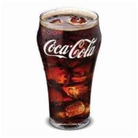 Soft Drinks  · A refreshing carbonated soft drink large.
