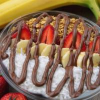 Bella Nutella · Blended acai topped with banana, strawberry, granola, coconut shaving and Nutella. 