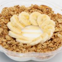 Coco Loco · Blended coconut topped with banana, granola and honey.