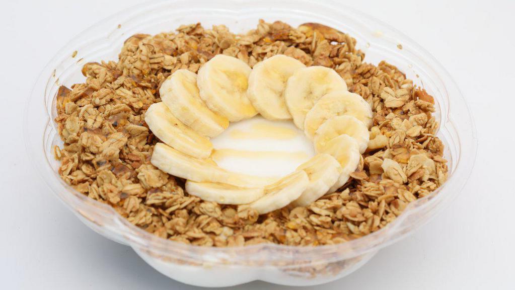 Coco Loco · Blended coconut topped with banana, granola and honey.