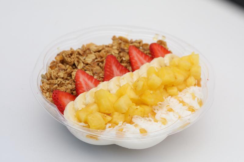 North Shore · Blended coconut topped with banana, strawberry, pineapple, coconut shavings, honey and granola.