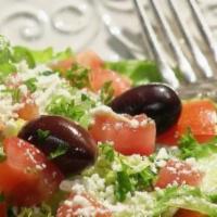 Greek Salad · Crisp lettuce, feta cheese, tomatoes, Persian cucumbers and kalamata olives. Healthy food. G...